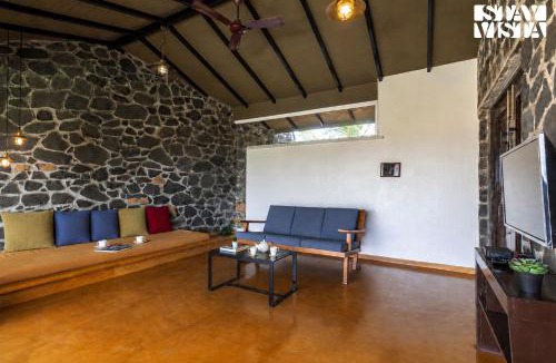 Nashik Villa | Stone House Bezze by StayVista with Lake view, Jacuzzi & Lawn - your perfect getaway