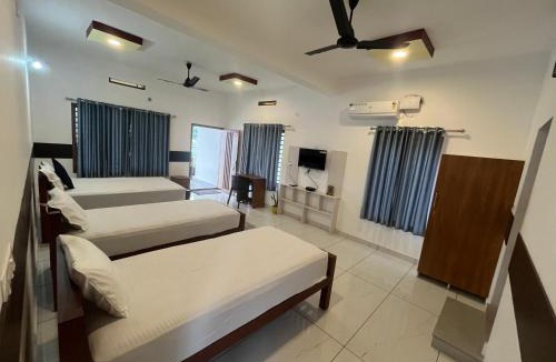 Malayattur Hotel | Romins Park