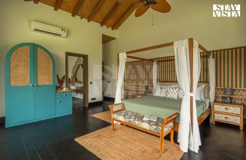 Vagator Villa | StayVista at Casa Dos Reis with Lawn & Pool