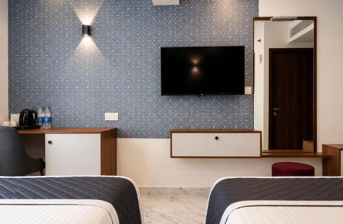 Karumom Hotel | Sabu's Grand Royale - Thampanoor