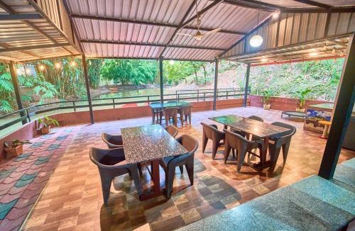 Virajpet Resort | Cave Ritz Coorg by VOYE HOMES - A Frame Cottages in Plantation - Pet Friendly