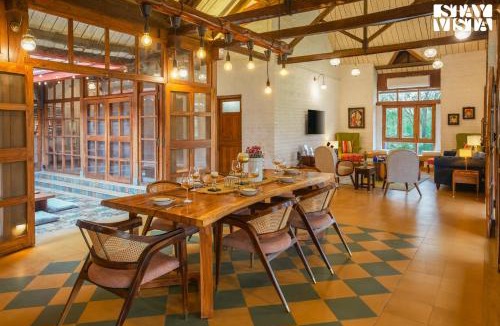 Sangavi Villa | StayVista at Orchard by the River with Bonfire, BBQ
