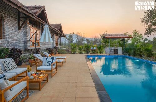 Sangavi Villa | StayVista at Orchard by the River with Bonfire, BBQ