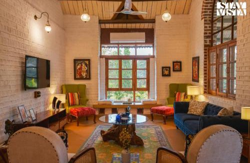 Sangavi Villa | StayVista at Orchard by the River with Bonfire, BBQ