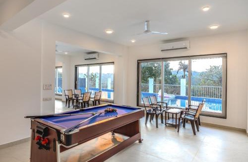 Dabolim House | Alaya Stays MidPoint Uno Pet-friendly 1 Room Retreat with shared pool, Entertainment Area and kids area Near Dabolim Airport