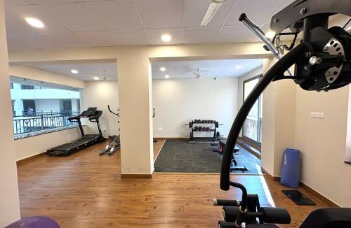 Sainagar Apartment | Boutique 1BHK Pool Retreat with Modern Amenities and Private Balcony