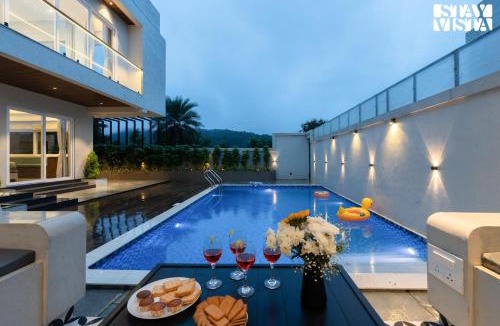 Khodala Villa | StayVista at Oriana Palms with Wifi and Pool