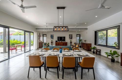 Alibaug Villa | SaffronStays Mayfair Gardens - 4BR pet-friendly pool villa with patio, den, board games & modern interiors near jetty