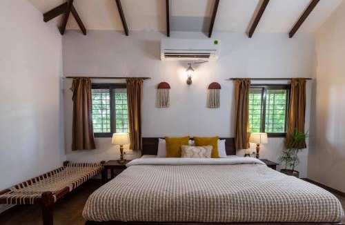 Nashik Villa | Farmhouse Retreat by StayVista - Classic architecture, Rustic interiors, Cozy rooms & A refreshing swimming pool