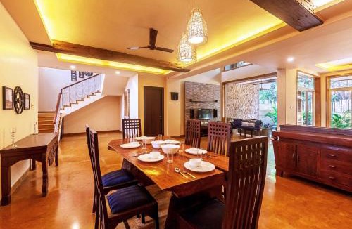 Kune Village Villa | StayVista's The Happy Hive - Cozy rooms and a pool for a delightful stay