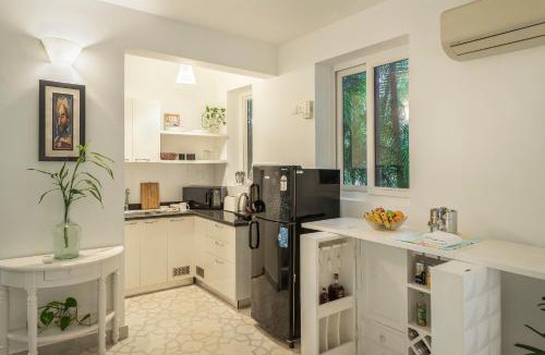 Reis Magos Apartment | Santa Terra by The Blue Kite - 1 & 2 BHK Apartments With Common Pool, Kitchen, Security & Wifi, Near to Casino & Candolim Beach