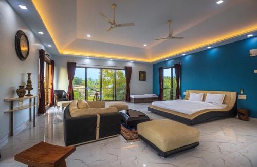 Alibaug Villa | SaffronStays Aura - 4BR luxury pool villa with gym, BBQ deck, lawns & indoor games near Kihim Beach