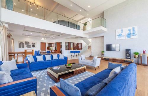 Kune Village Villa | StayVista's White Pebbles - A Villa with Theater Room & Swimming Pool