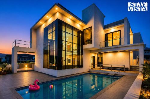StayVista at Villa 9 Squares with Lawn & Pool