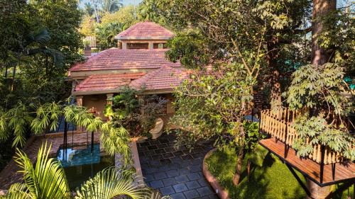 SaffronStays Kapok House