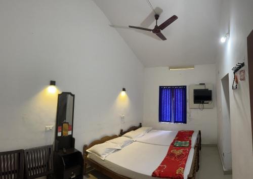 Dakshinakasi Guest House